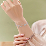 1Pc Flower Alloy Cuff Bangles for Women, Bell Charms Open Bangles, Platinum, Inner Diameter: 1-7/8x2-3/8 inch(4.7x5.9cm)(BJEW-LP0003-43)