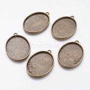 Tibetan Style Alloy Oval Tray Pendant Cabochon Settings, Plain Edge Bezel Cups, Cadmium Free & Nickel Free & Lead Free, Antique Bronze, Tray: 40x30mm, 48x34x3mm, Hole: 3mm, about 93pcs/1000g(TIBEP-A19948-AB-FF)